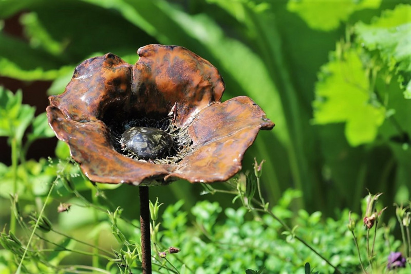 Gartenkunst blüht im Verborgenen – Ton trifft Holz